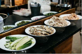 This photo shows raw ingredients arranged on plates for festive cooking