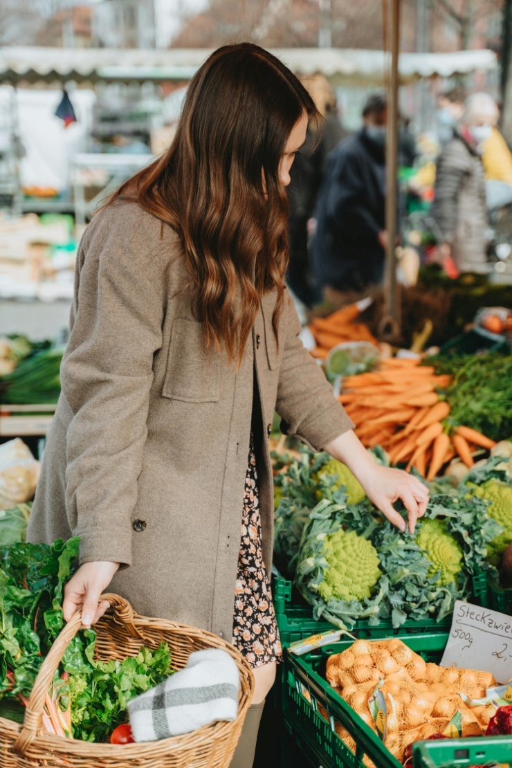 A person buying vegetables